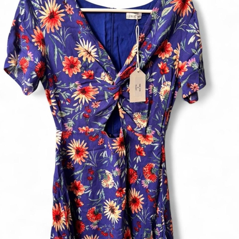 Unik Boutique Floral Blue dress. Size small. New with tags